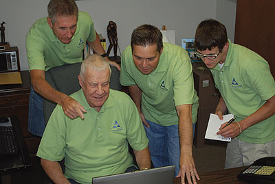 From Left: Analtech’s Terry McVey, production manager; Matt Lampkin, founder and owner; Steven Miles, general manager; and Mickey Jones, human resources manager work together to streamline the manufacturer’s processes at its Newark facility. Photo provided by Analtech