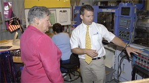 Ken Orr, owner of Atlantis Industries, Inc., explains the molding process to Governor Ruth Ann Minner inside Atlantis’ Milton facility. Streamlining processes like this one was made possible with help from DEMEP.